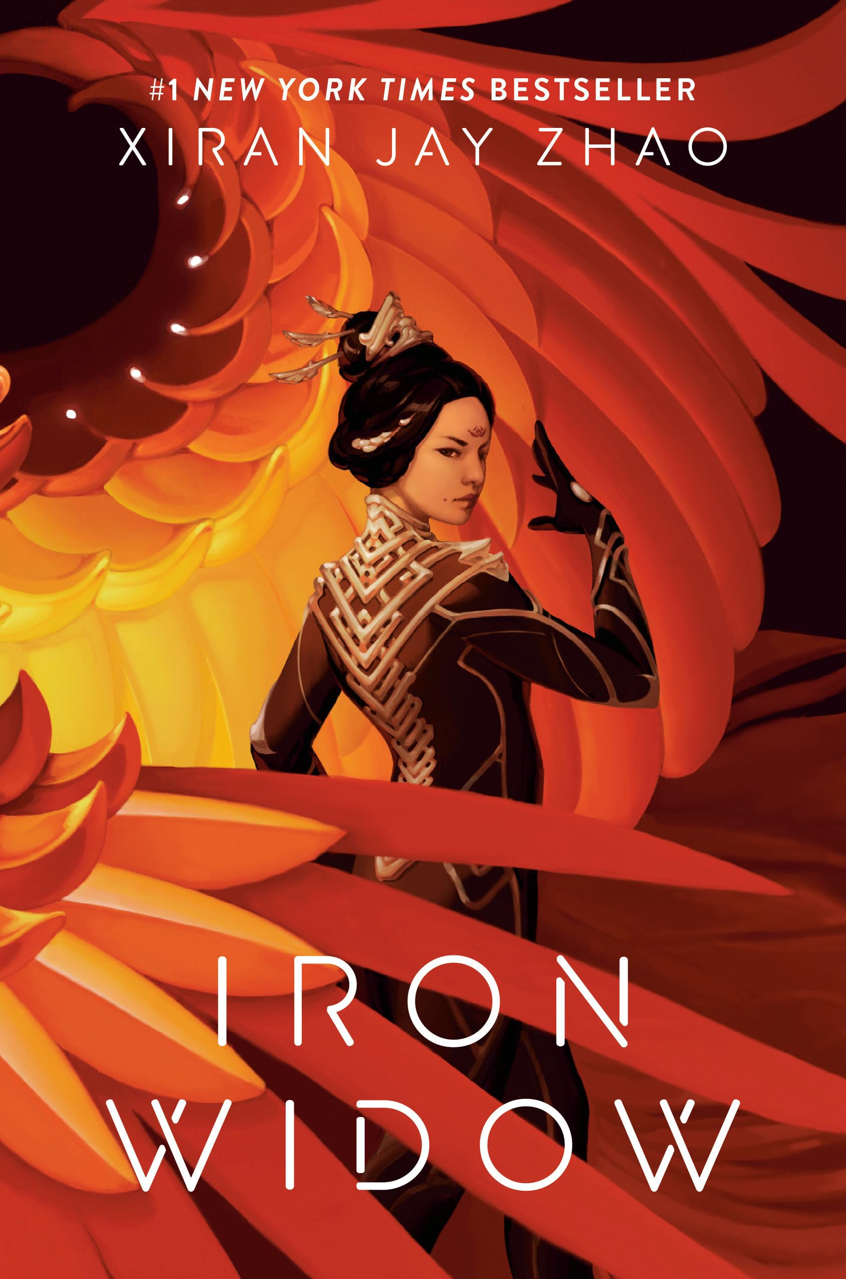 "Iron Widow" by Xiran Jay Zhao
Vivid cover featuring a stylized woman in a warrior outfit standing in front of swirling orange and red feathers, turning toward the viewer with a determined gaze. The title “Iron Widow” is in bold white letters.