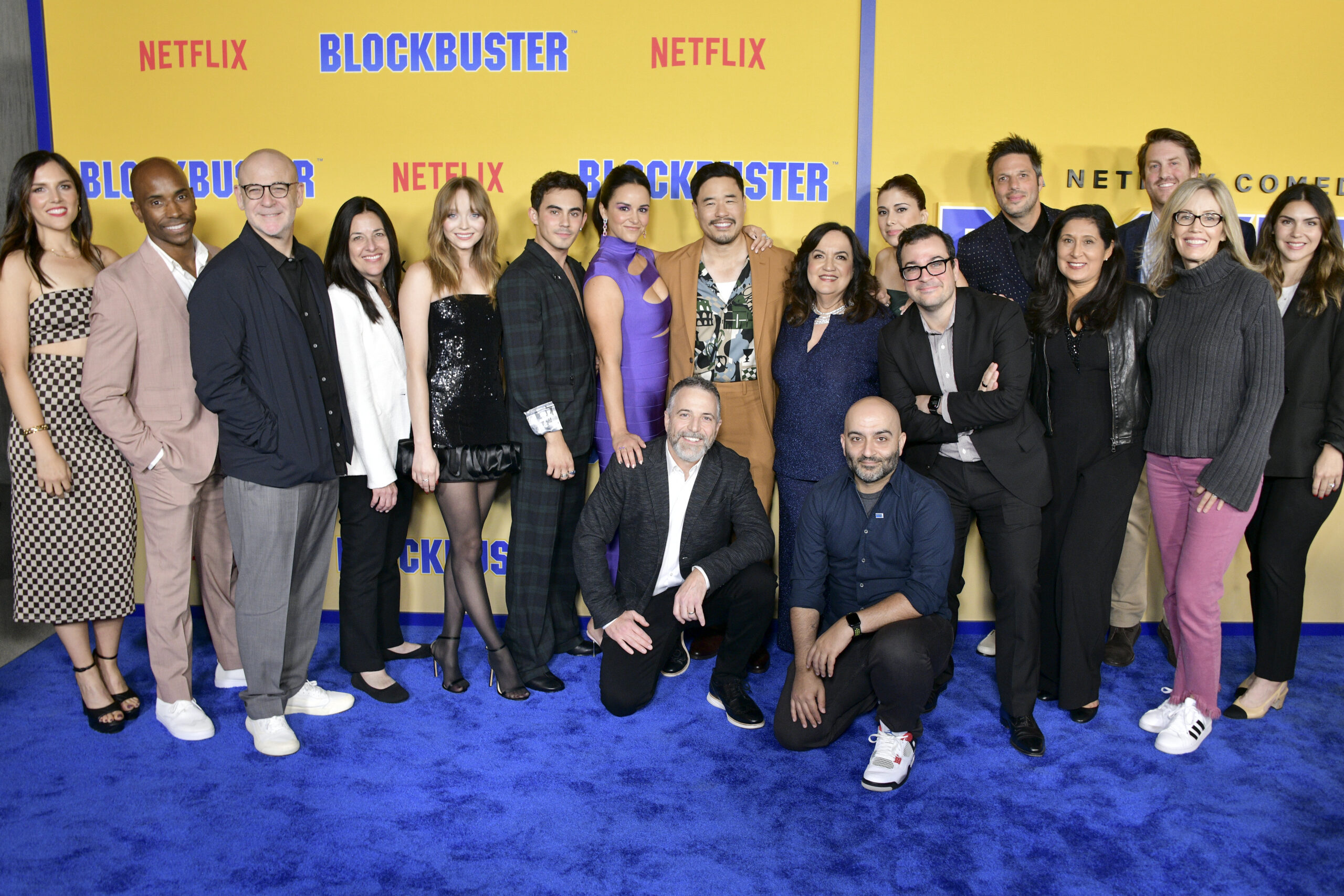 Cast and crew of Blockbuster on the blue carpet at the season one premiere in Los Angeles. 