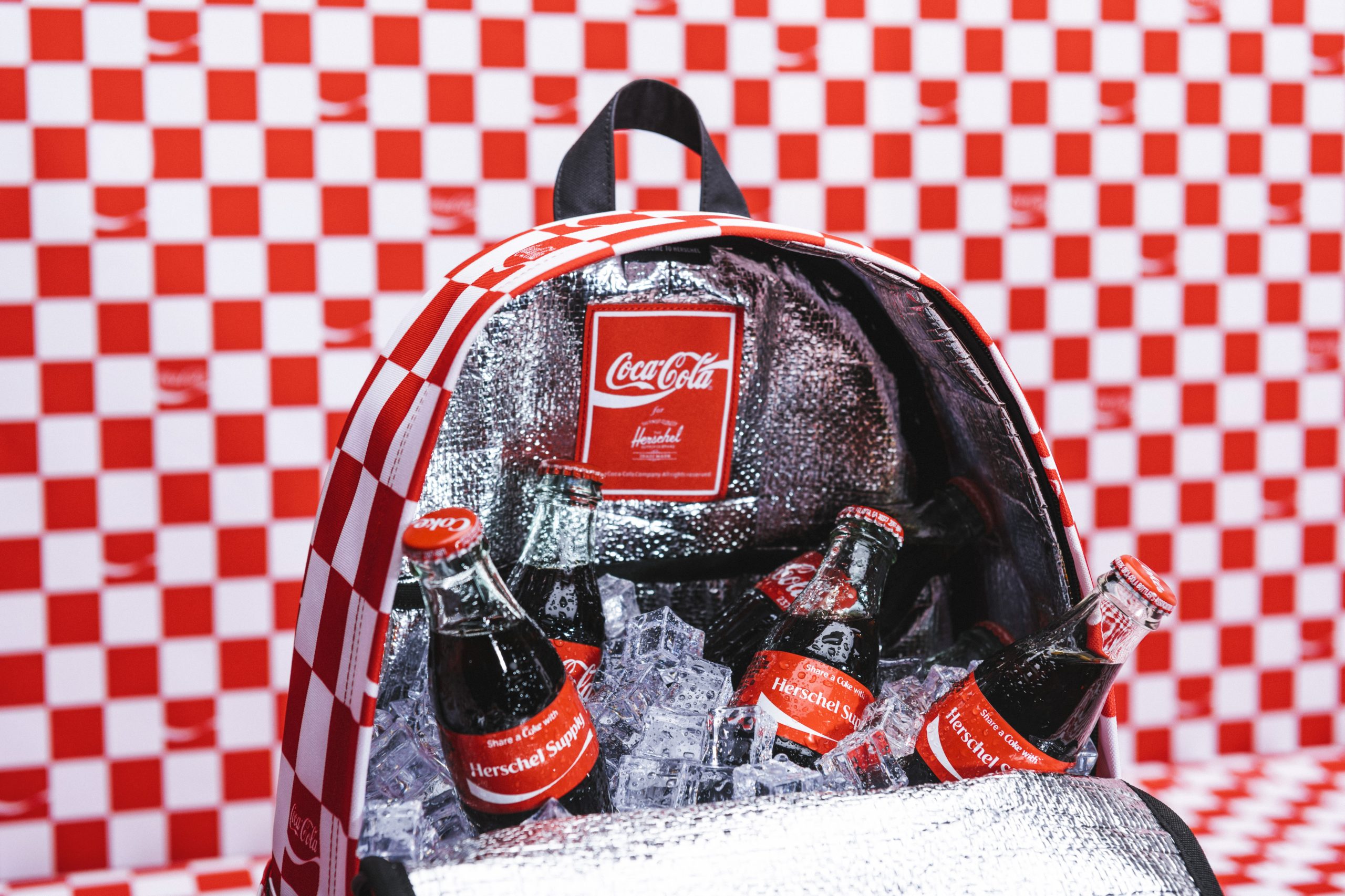 Herschel Supply Co. collaboration with Coca Cola as fashion items for bags.