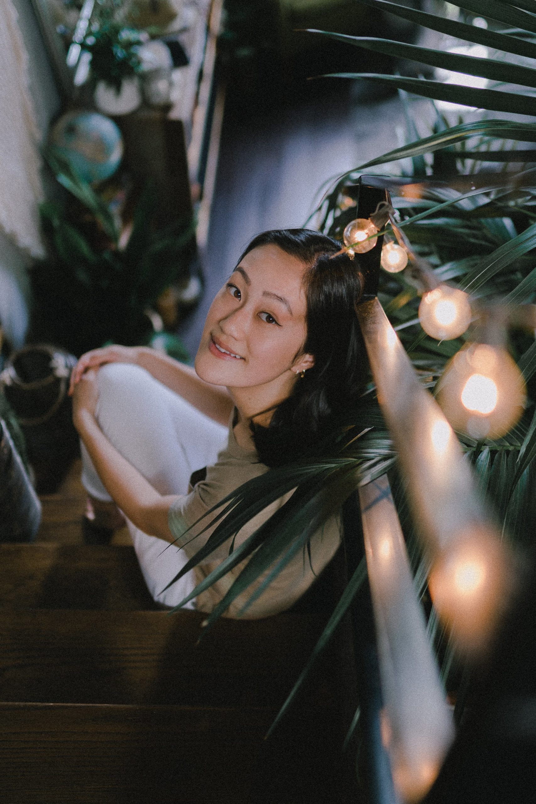 Recloseted founder Selina Ho sitting in a stairway