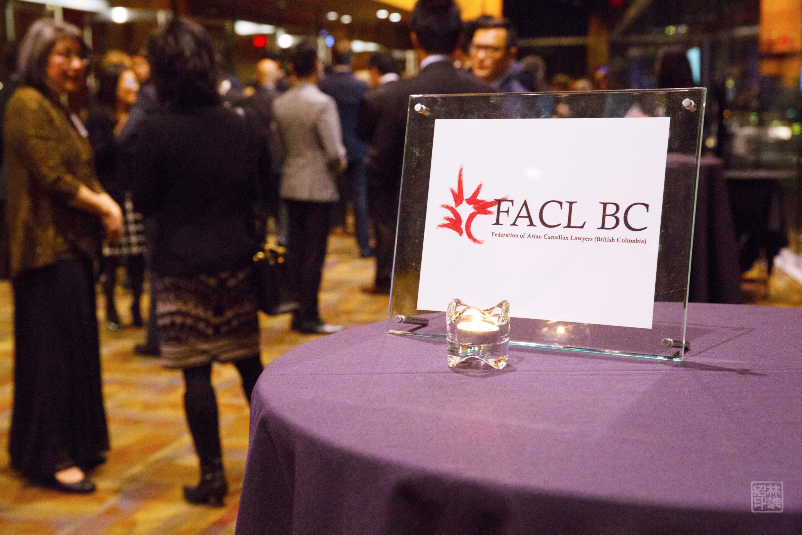 A stand on a table at a gala