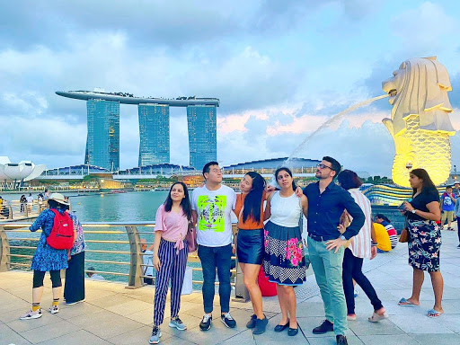 Author and friends in front of the Marina Bay Sands Hotel in Singapore.