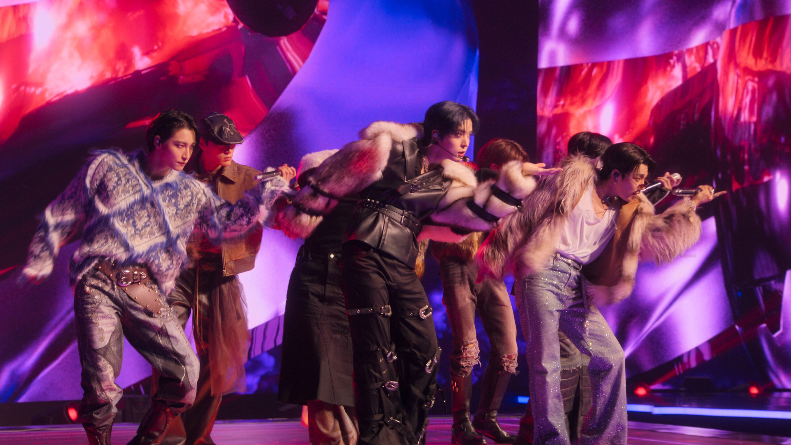 ATEEZ performing on stage for KPOPPED