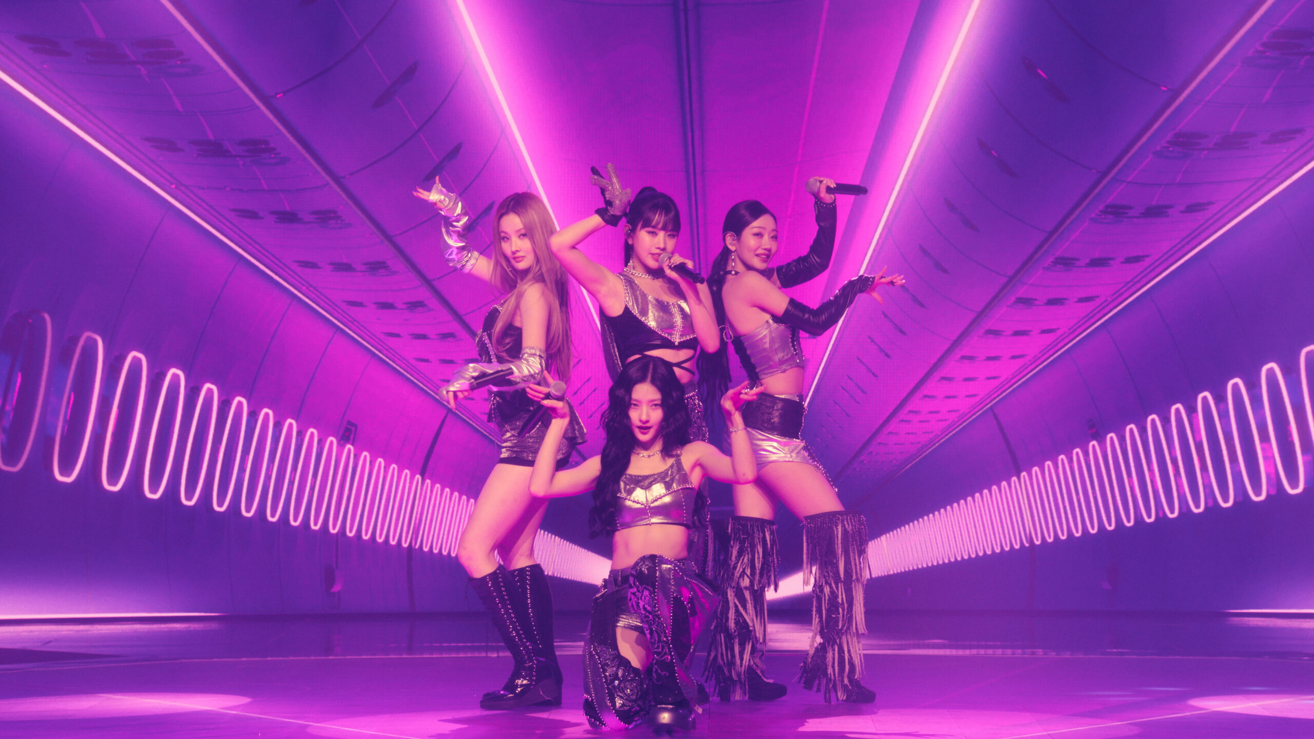 Kiss of Life posing on stage for KPOPPED