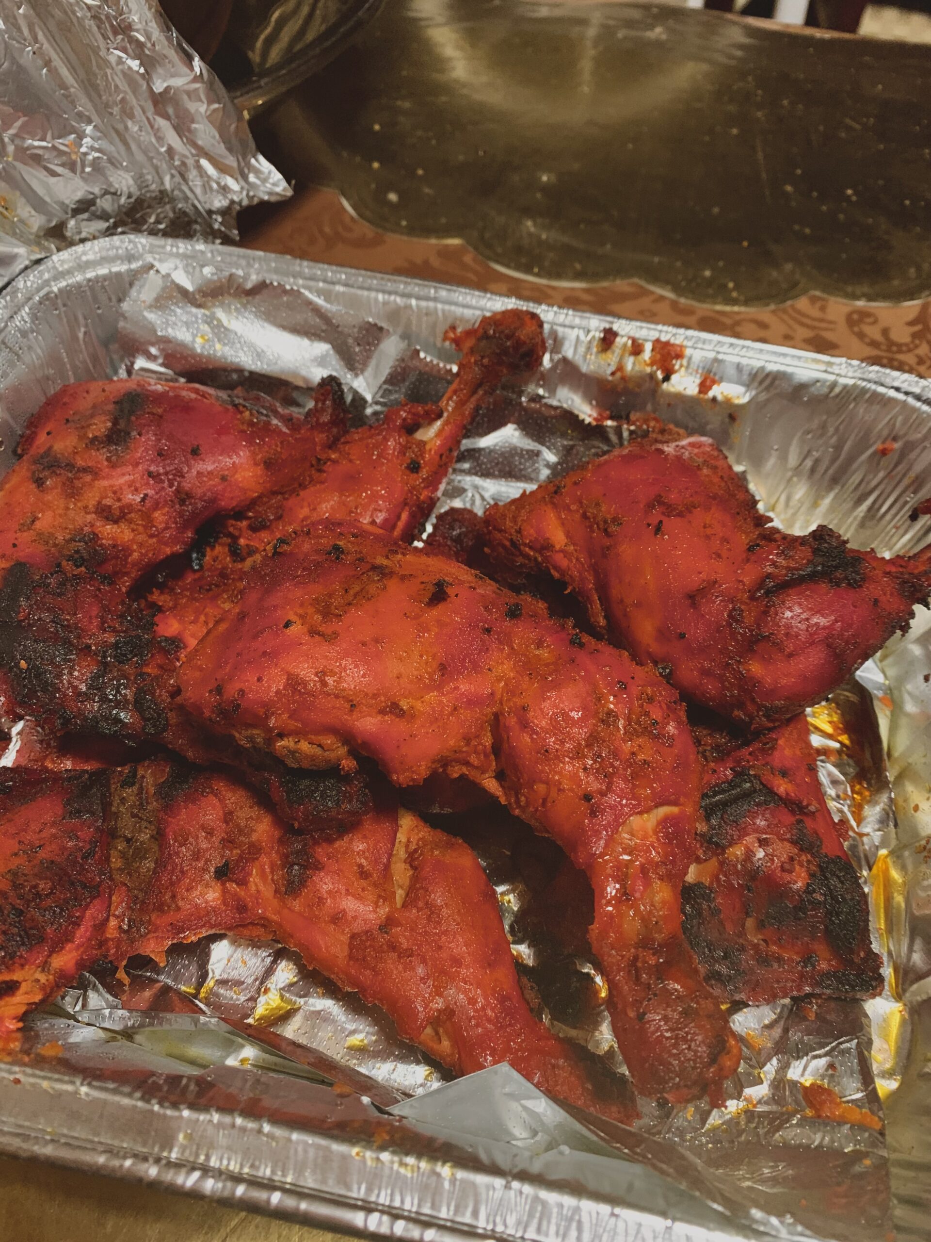 Signature roast chicken, a Pakistani food dish passed down through the author's family.