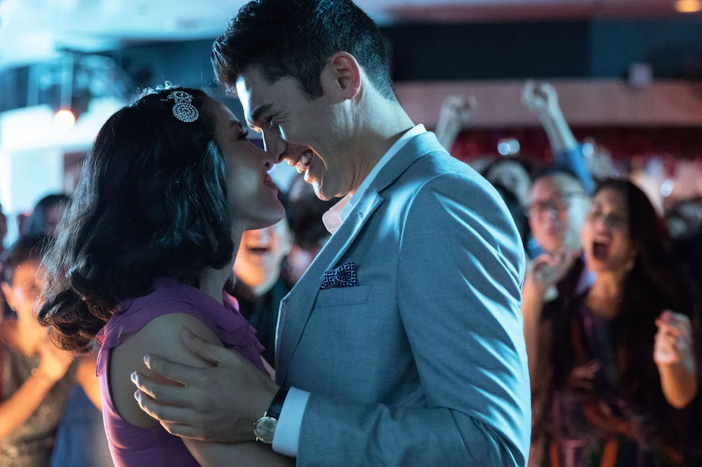 Nick Young, played by Henry Golding, an Asian male actor, shares a romantic moment with Constance Wu's Rachel.