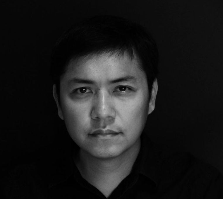 Black-and-white headshot of Wu Ming-Yi