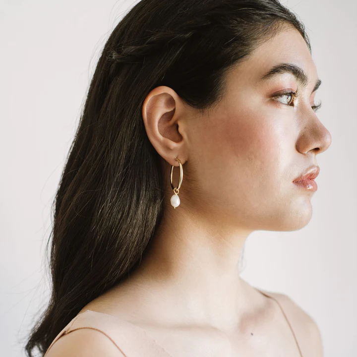 Kara Yoo Anna earring with pearl drop charm on woman for the 2022 Asian Canadian gift guide