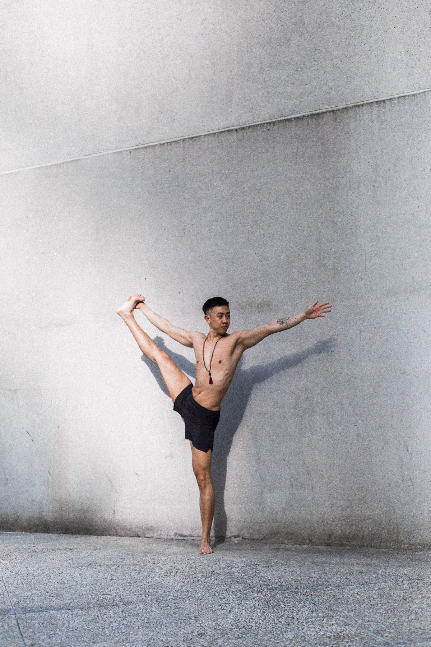 Marcus Tong in a yoga pose