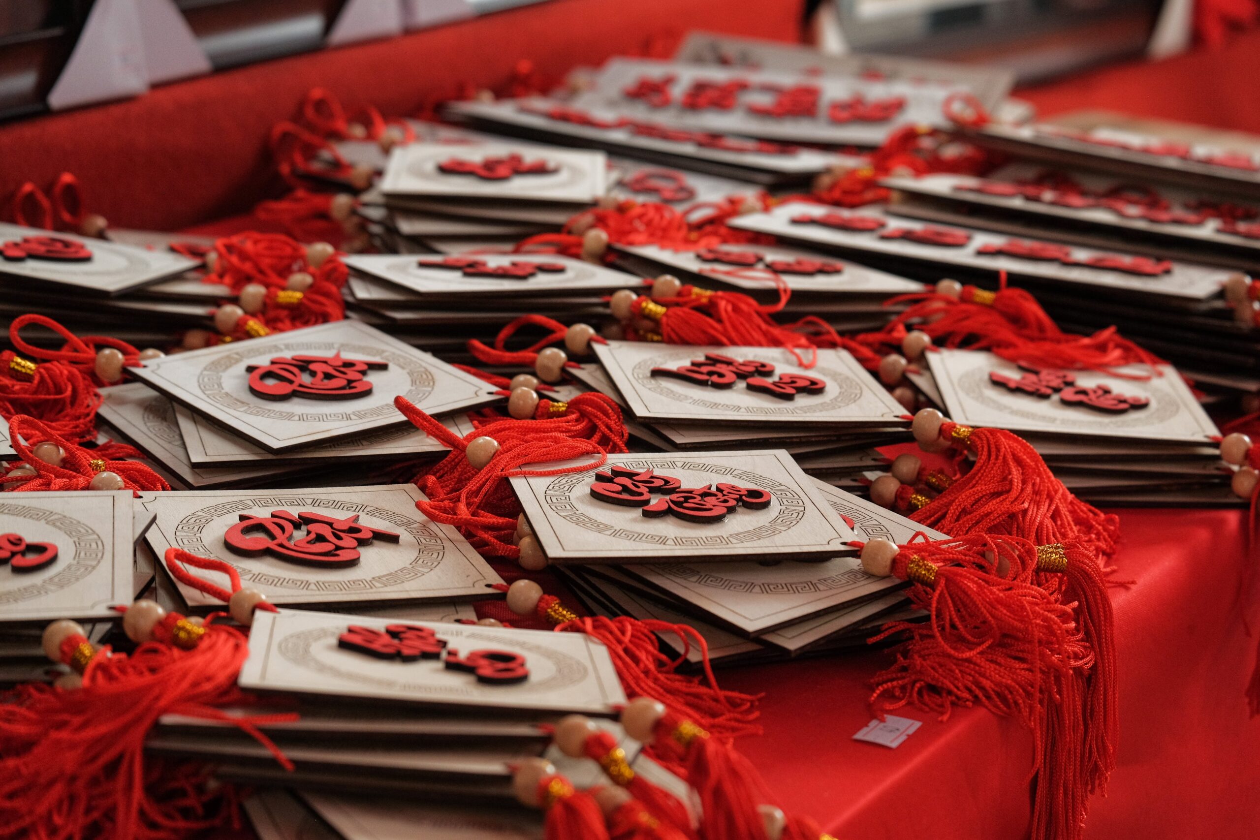 Red fai chun decorations on a table