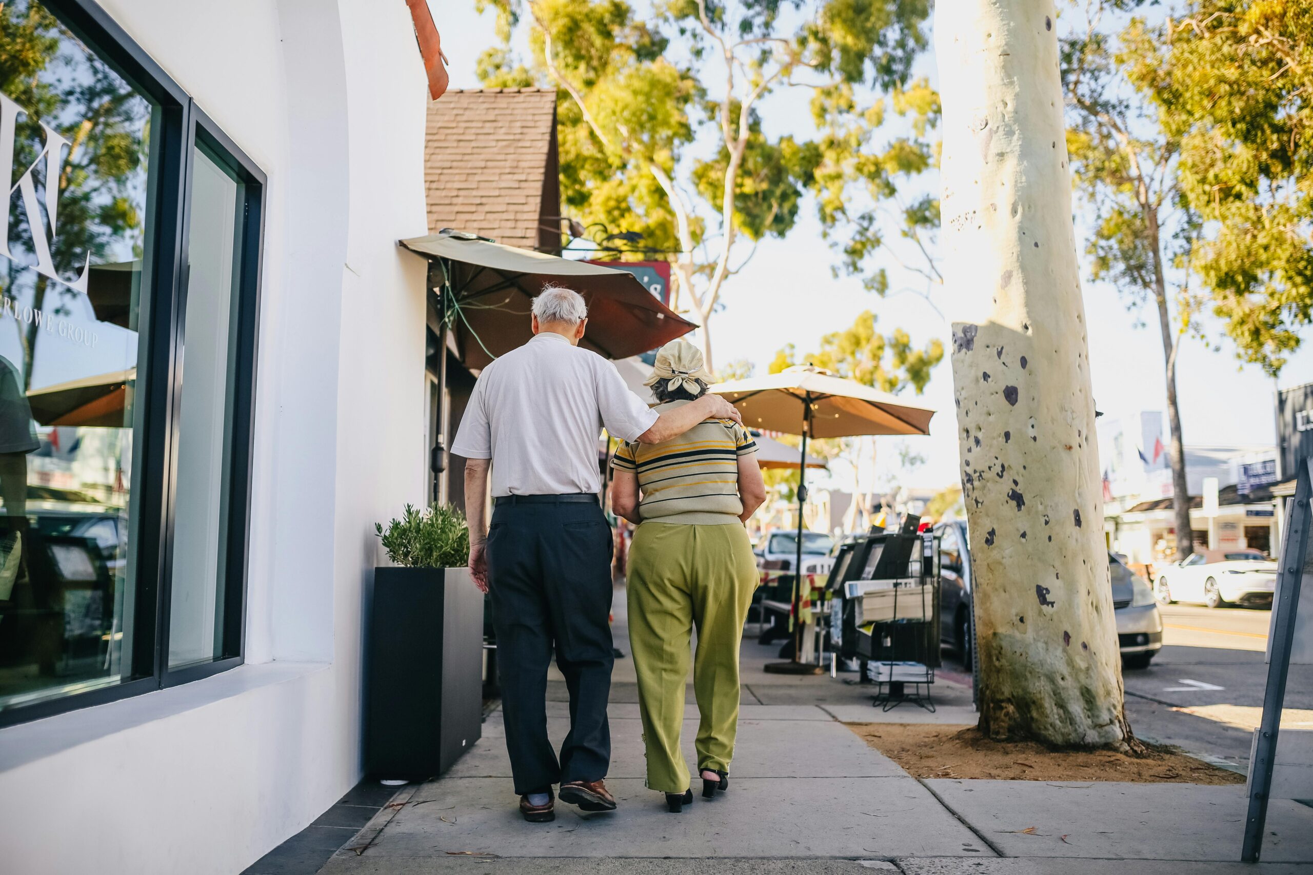 Old elderly Asian parents walking together