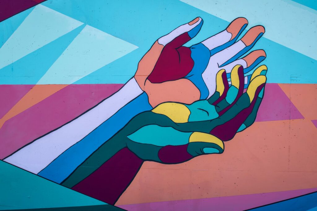colorful hands held together